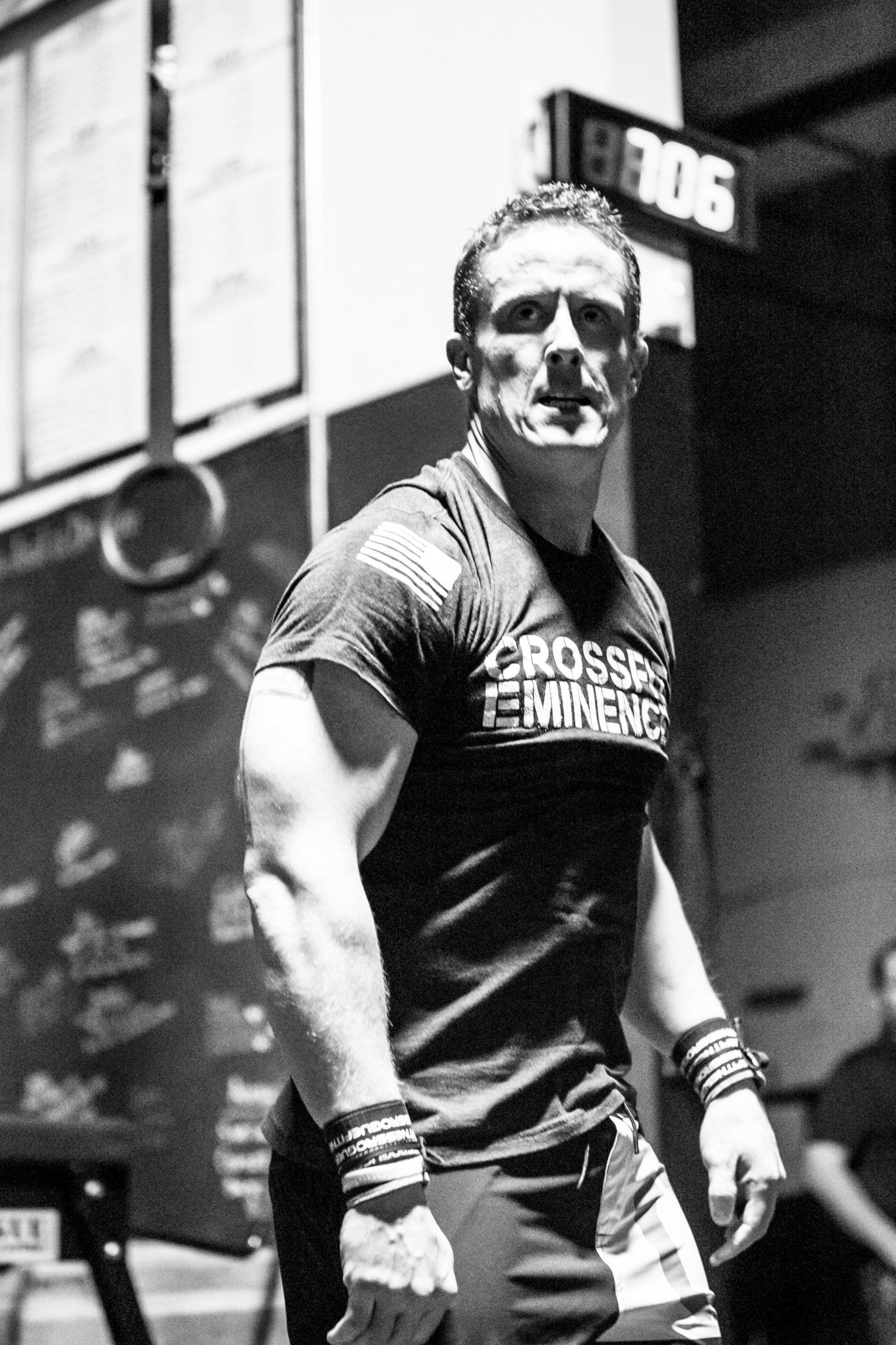 Male CrossFit Athlete Post-Workout with Focused Gaze in Black and White