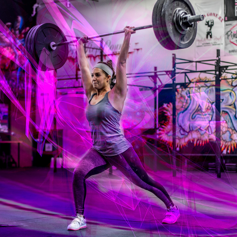 Athlete performing a barbell lift amidst dynamic pink and purple digital effects